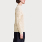 Turtleneck cable knit women's sweater