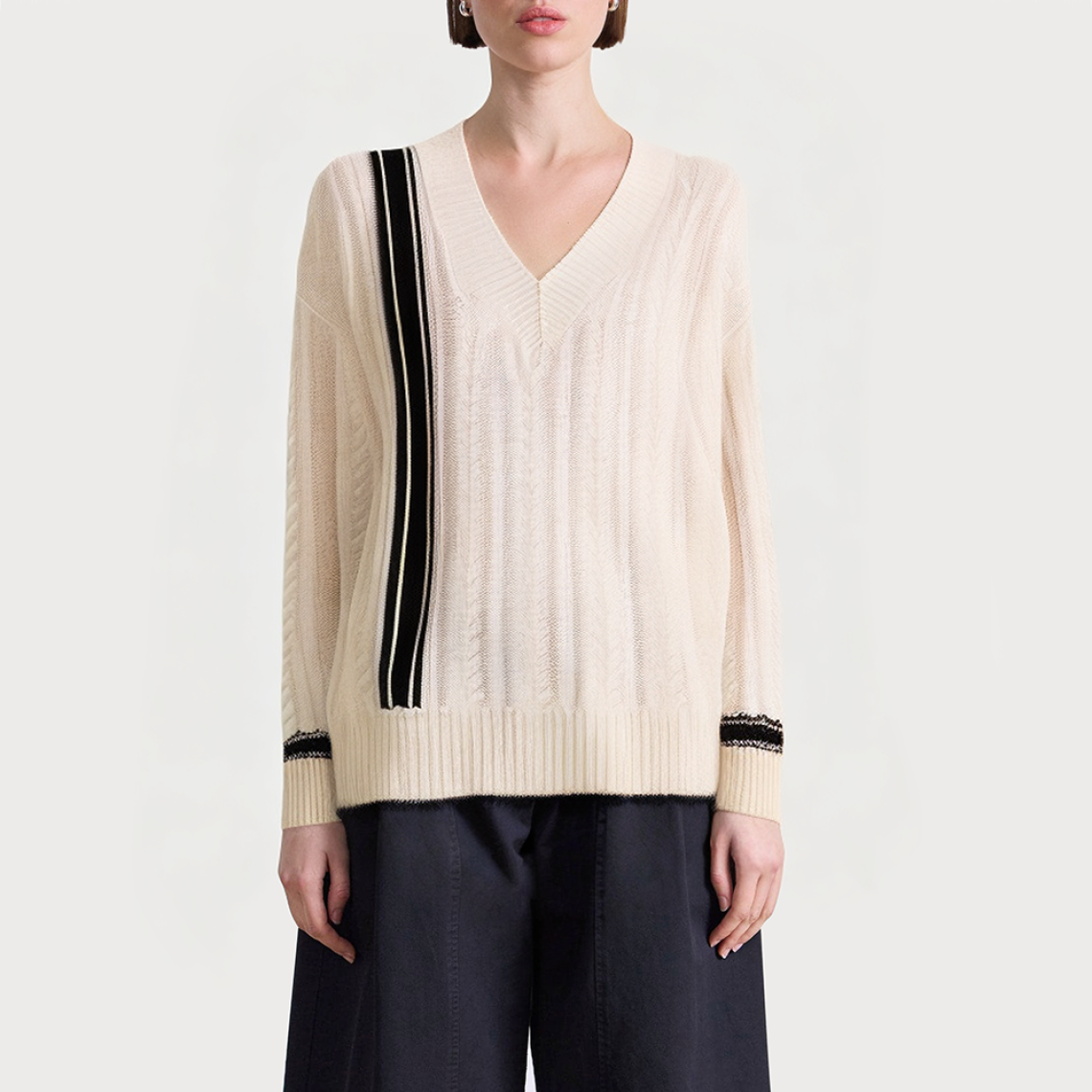 Beige cable knit V-neck women's sweater