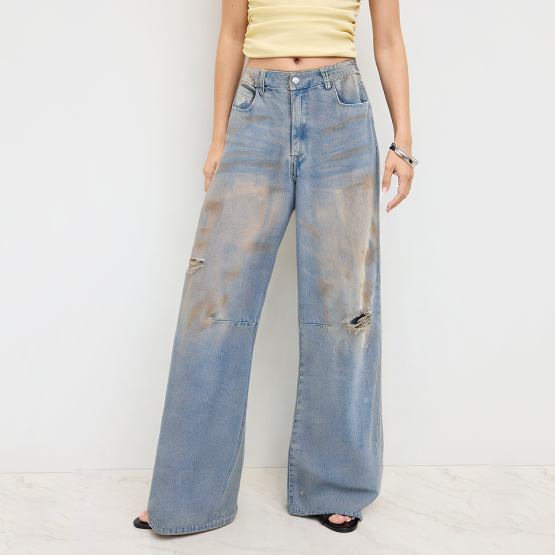 Distressed faded ripped jeans for women