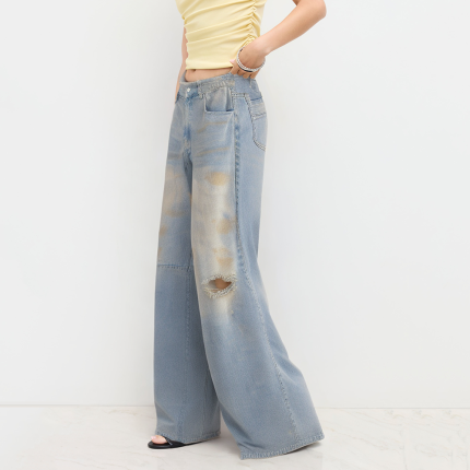 Distressed faded ripped jeans for women