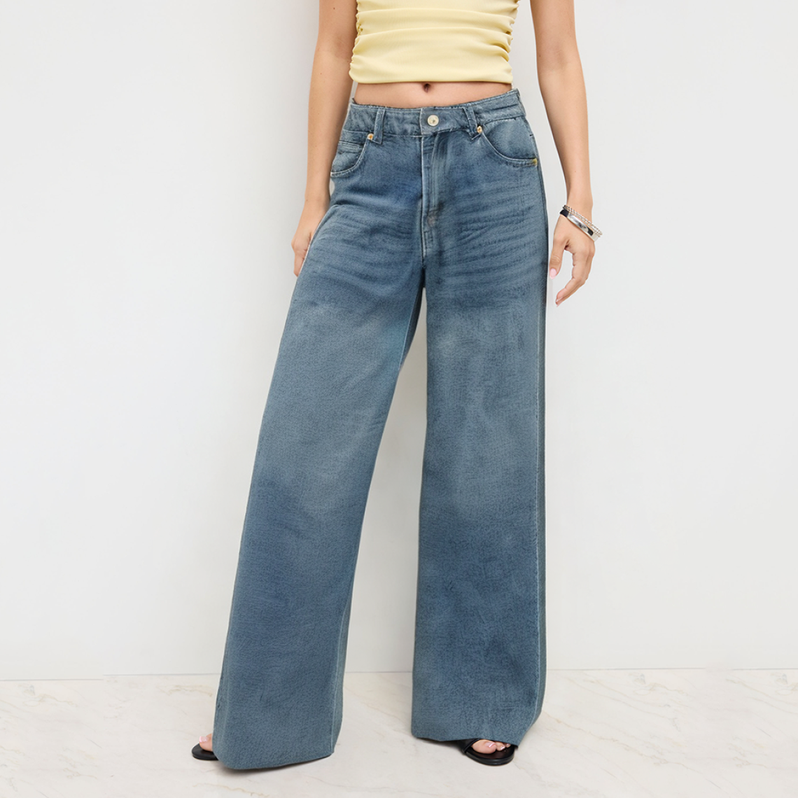 Vintage washed faded women's denim trousers